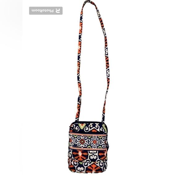 Vera Bradley crossbody bag.  Lots of organization in a compact bag. ID window - Picture 1 of 6